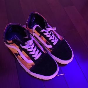 Camo white yellow and orange vans.